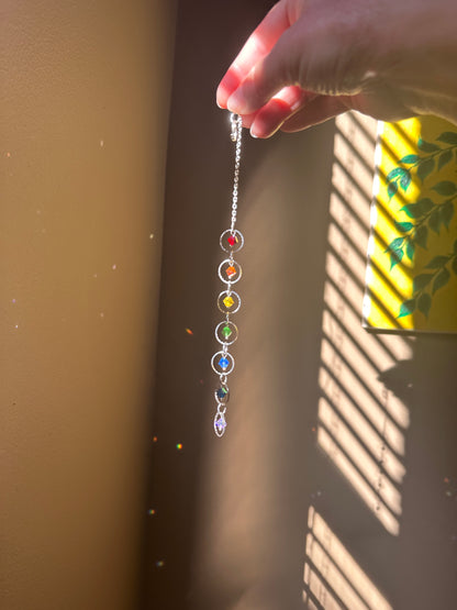 Mini Chakra Suncatcher

European Crystal glass Rainbow maker handmade by Marianna Mills artist.

Length 9 inches approx.