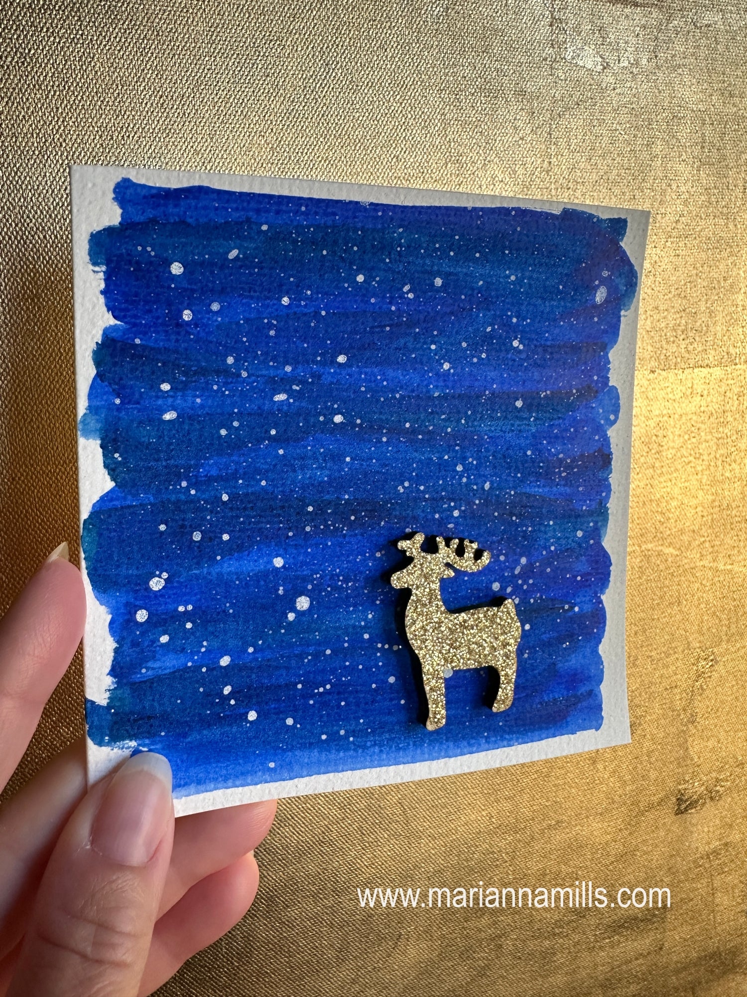 Hand painted Christmas Card #5 Snowy land with a glittery wood reindeer embellishment.