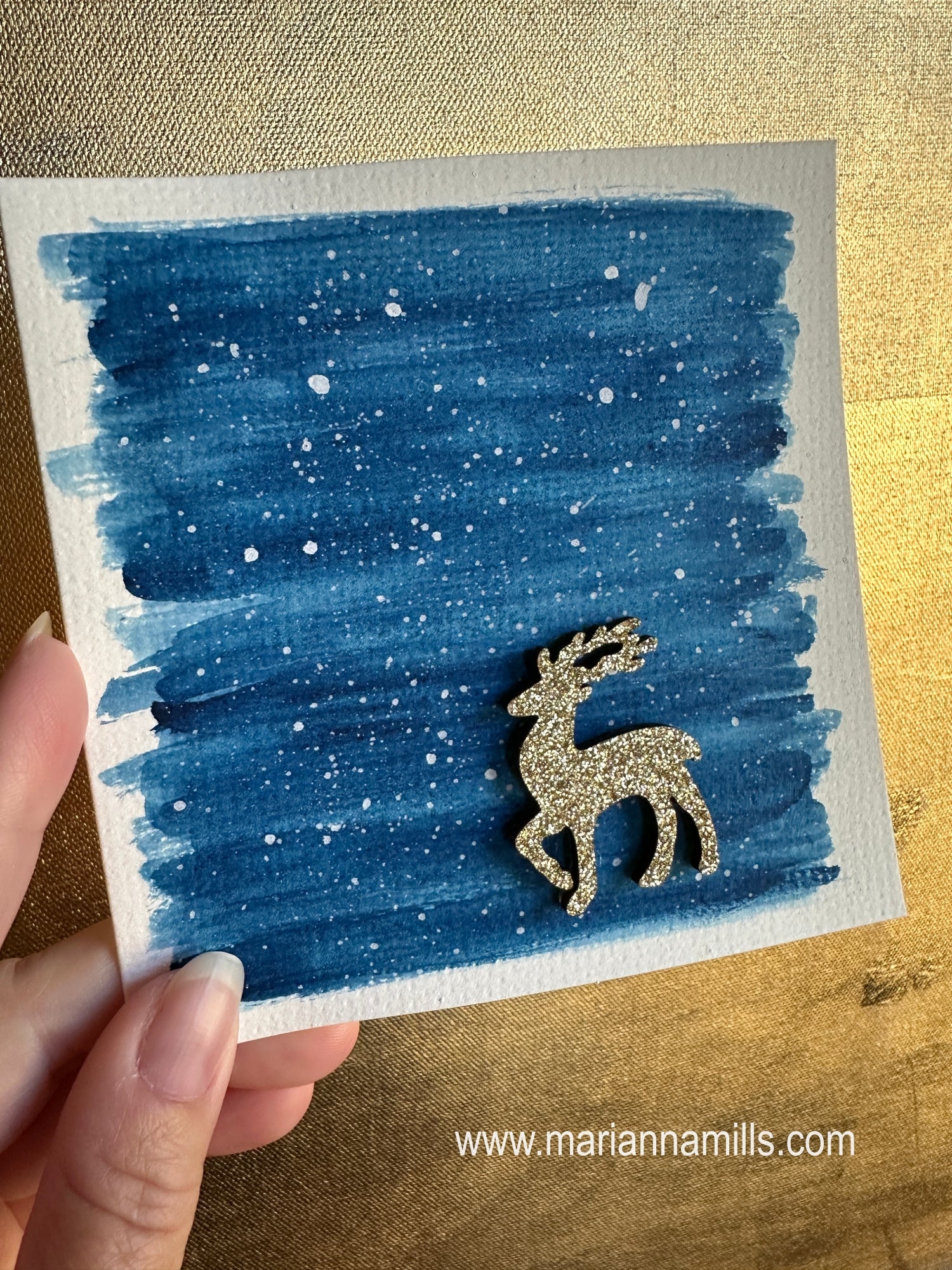 Hand painted Christmas Card #3 Snowy land with a glittery wood reindeer embellishment.