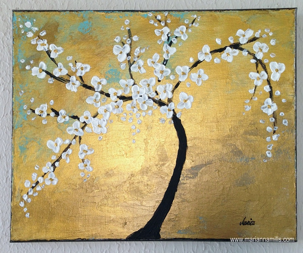 original small acrylic impasto surreal painting by Hungarian visionary artist Marianna Mills. 10”x12” size. Title: Cherry Blossom Tree in gold.. is a beautiful contemporary fine art featuring a sakura tree with white blossoms, teal green and gold colors to give a desired effect to this amazing artwork. Already Sold