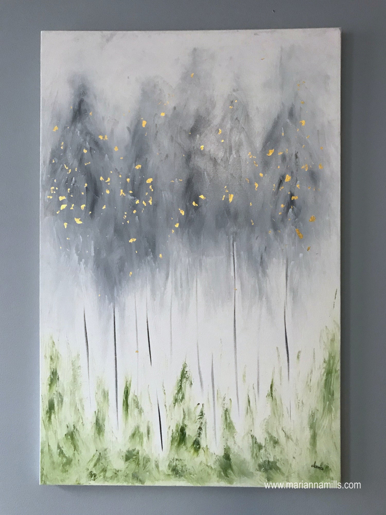 original surreal oil painting with 22k gold leaves by Marianna Mills, Hungarian artist. title is The first of Phoenix and it featuring gray trees with white background and fresh green grass.