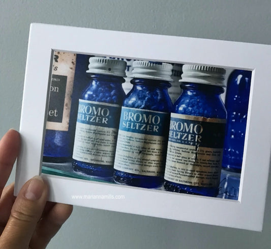 My photograph of the Bromo Seltzer Vintage Glass Bottles Collection is now available as a small matted signed art print. 